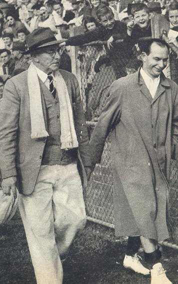 Harry Beitzel leaves Glenferrie Oval after suffering a leg injury in 1957.