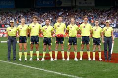 MELBOURNE, AUSTRALIA - DECEMBER 03: The Umpires pose for their team photo during the 2023 AFLW Grand Final match between The North Melbourne Tasmanian Kangaroos and The Brisbane Lions at IKON Park on December 03, 2023 in Melbourne, Australia. (Photo by Michael Willson/AFL Photos)