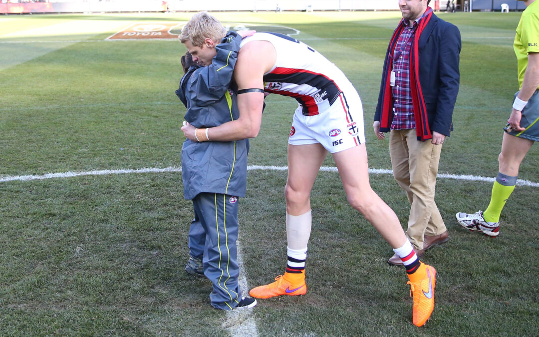 Nick Riewoldt gives beautiful hug to Lauren Eaves before St Kilda v Melbourne clash