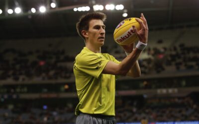 AFL Boundary Umpire – Drew Kowalski celebrates 150 games